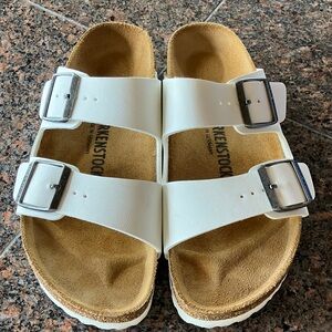 Birkenstock White Sandals with Metallic Buckles